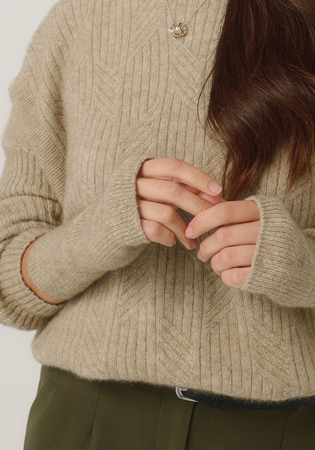 Merinomink Handwarmer Latte 0638