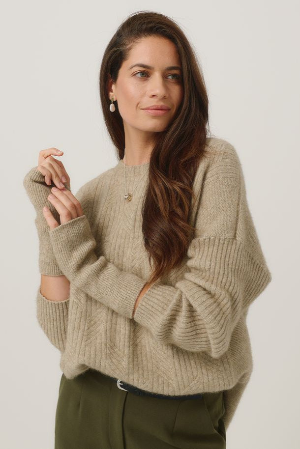 Merinomink Handwarmer Latte 0638